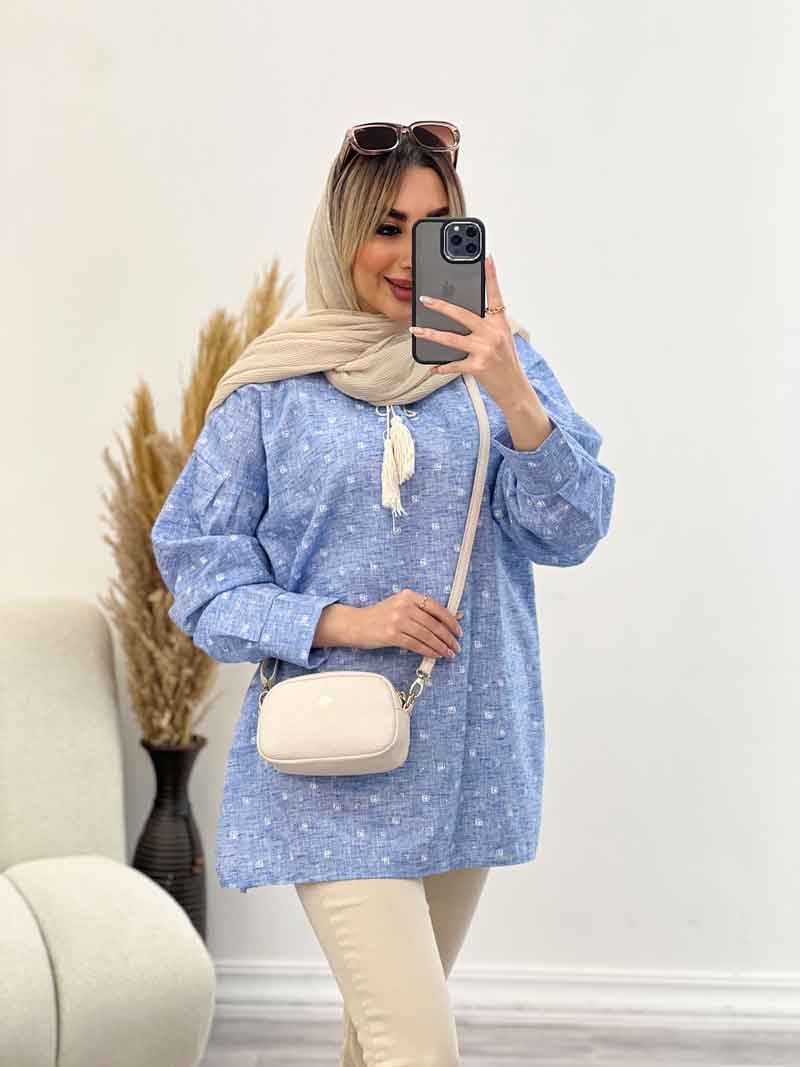 مانتو جلو بسته منگوله دار کد 4553 مانتو جلو بسته منگوله دار کد 4553