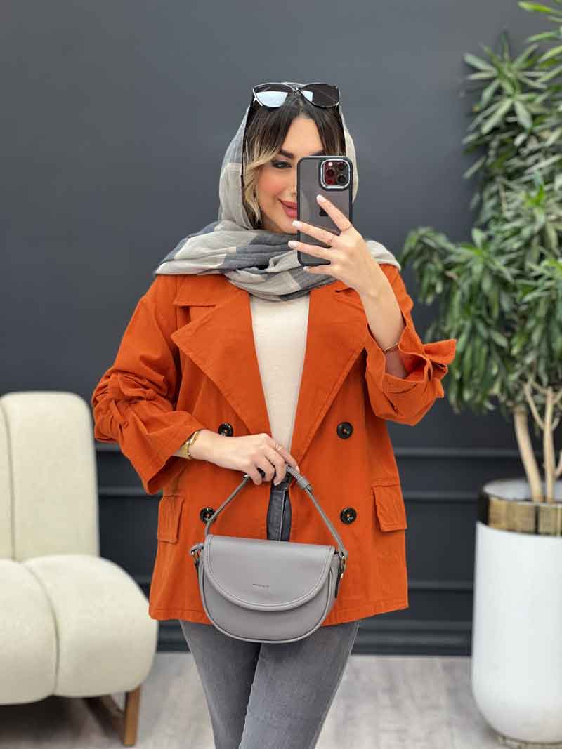 مانتو چهار دکمه آستین بند دو جیب کد 4943 مانتو چهار دکمه آستین بند دو جیب کد 4943