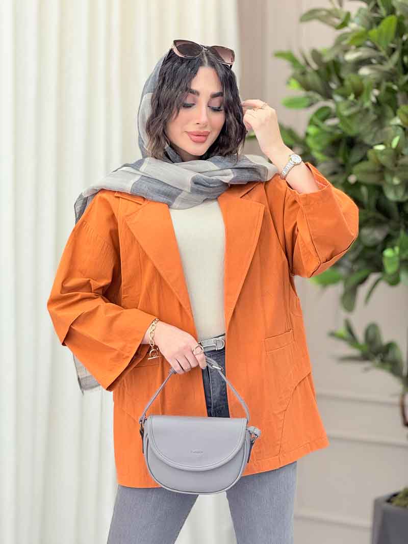 مانتو برش هلالی دو جیب آرزو کد 6323 مانتو برش هلالی دو جیب آرزو کد 6323