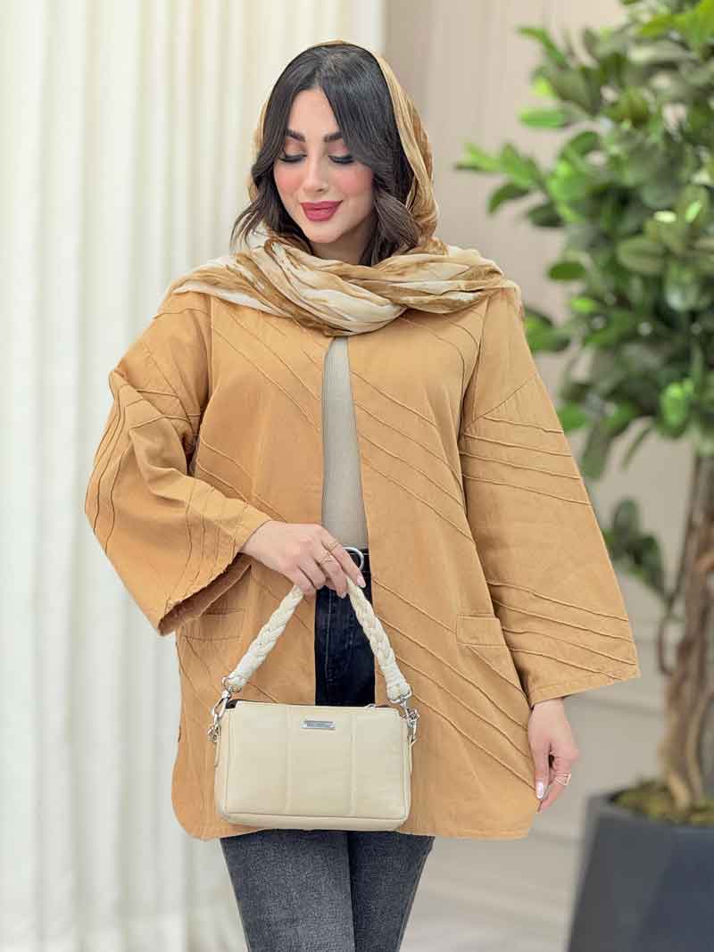 مانتو برش دار بغل چاک کد 6318 مانتو برش دار بغل چاک کد 6318