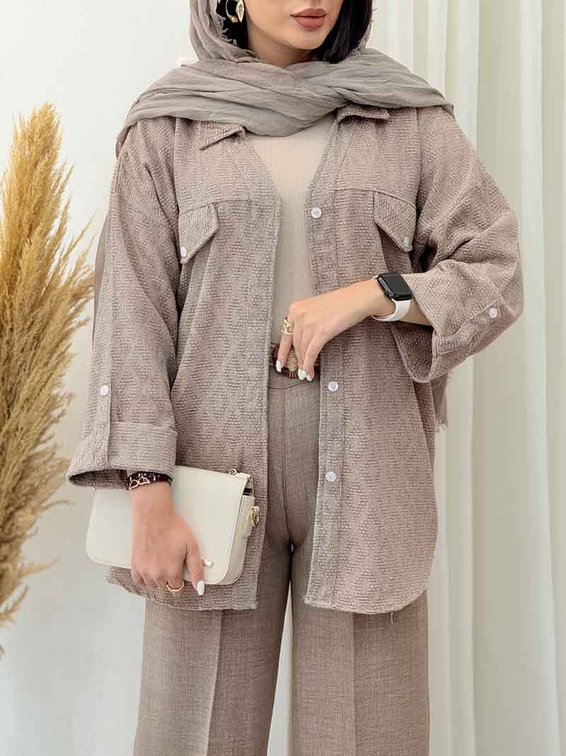 مانتو طرح لوزی جیب نما آستین پاگن کد 7077 مانتو طرح لوزی جیب نما آستین پاگن کد 7077